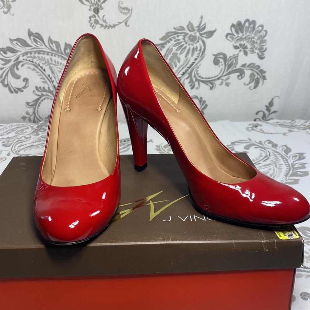 Vincent patent‎ leather heels with leather sole.